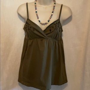 Ladies top.  Embroidered flowers enhance front